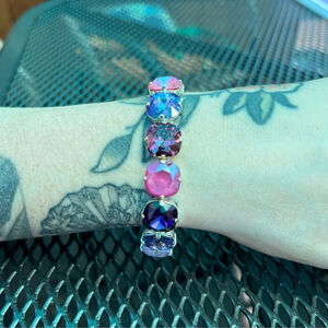 Handcrafted statement bracelet with Swarovski crystal pinks and purples